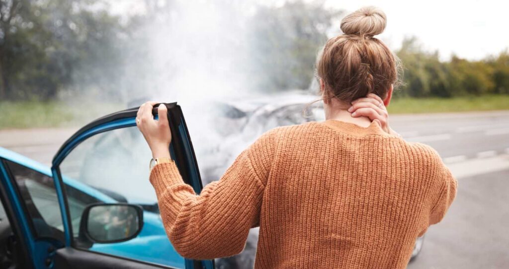 woman with hurt neck after a car wreck